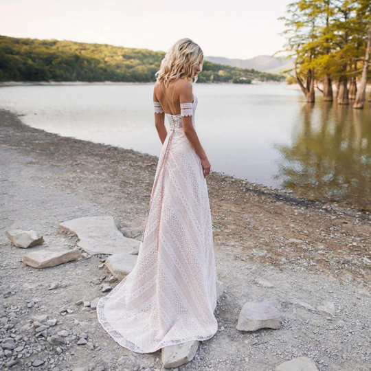 Sensational Bohemian A-Line gown for Wedding Bride Garden Beach with Spaghetti Straps, Bracelet sleeves and Crossover Back design. - Bella Grace