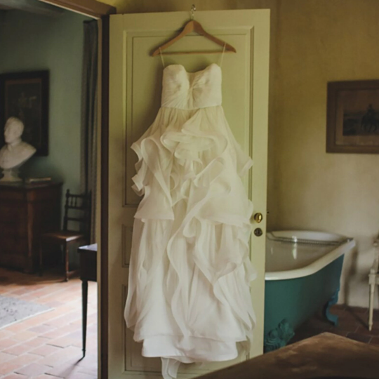 Amazing Strapless Organza Cascading Ruffled Bridal Gown with Cream Satin Tieback Waistband -  In White. - Bella Grace