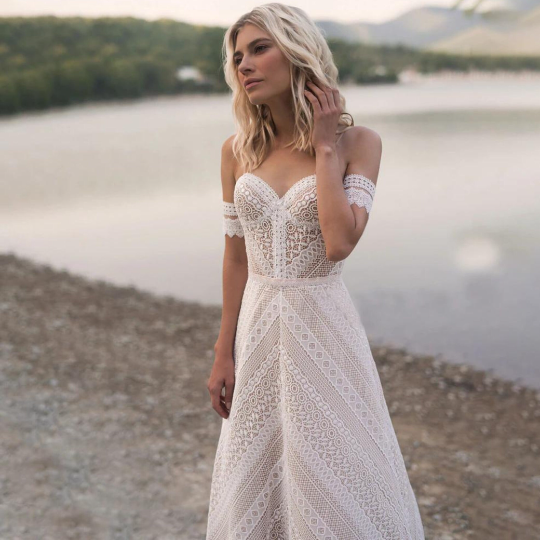 Sensational Bohemian A-Line gown for Wedding Bride Garden Beach with Spaghetti Straps, Bracelet sleeves and Crossover Back design. - Bella Grace