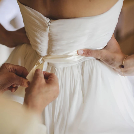 Amazing Strapless Organza Cascading Ruffled Bridal Gown with Cream Satin Tieback Waistband -  In White. - Bella Grace