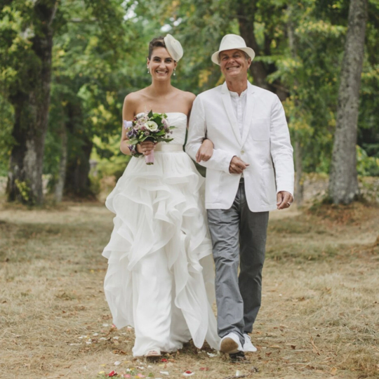 Amazing Strapless Organza Cascading Ruffled Bridal Gown with Cream Satin Tieback Waistband -  In White. - Bella Grace