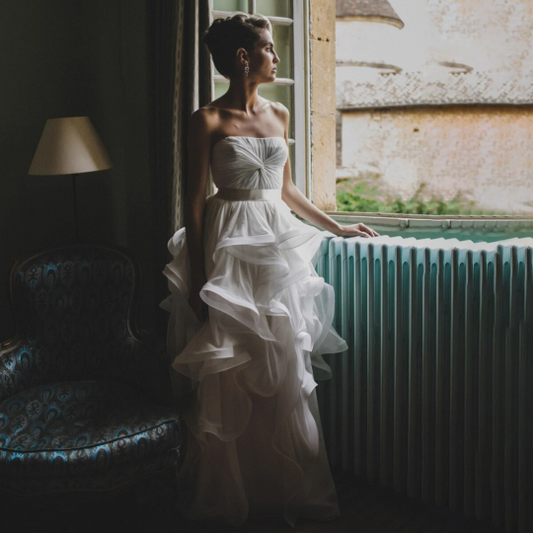 Amazing Strapless Organza Cascading Ruffled Bridal Gown with Cream Satin Tieback Waistband -  In White. - Bella Grace