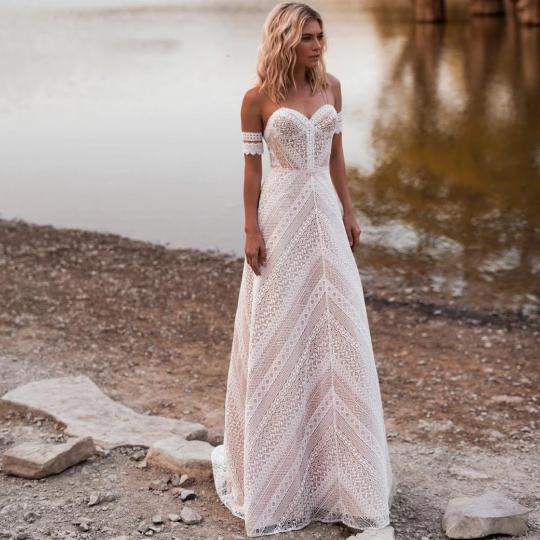 Sensational Bohemian A-Line gown for Wedding Bride Garden Beach with Spaghetti Straps, Bracelet sleeves and Crossover Back design. - Bella Grace